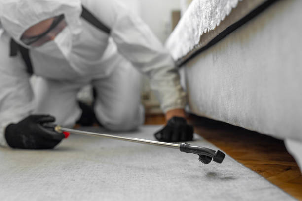 Professional Pest Control technician working in Oliver County County, ND